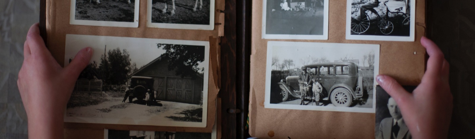 child holding photo album